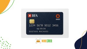 A dark blue BFA debit card featuring an elegant pattern, gold chip, white embossed numbers, and the name 'Gustavo Machado', with BFA and debit logos in red and white, displayed on a white background with colorful abstract shapes and the MineCred logo at the bottom.