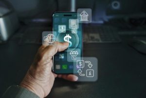 A hand holding a smartphone displaying various financial icons, representing the growing influence of digital banks and fintech applications in mobile banking services.