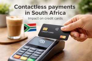 Contactless payment in South Africa using a credit card on a payment terminal, with South African flag in the background, illustrating the impact of contactless payments on credit card usage.